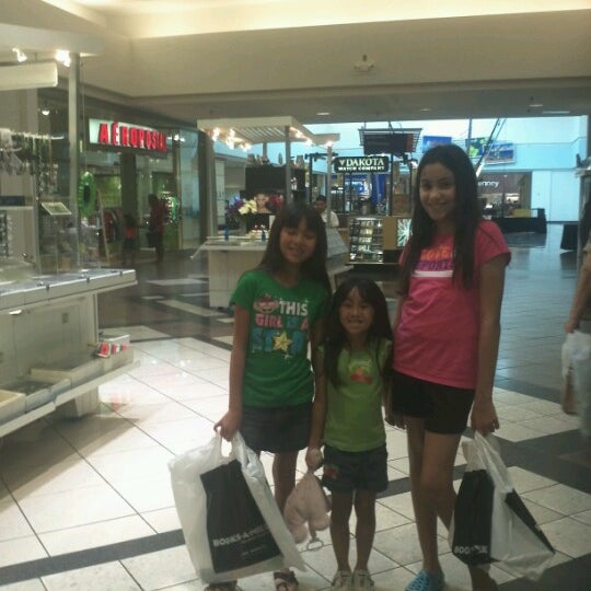 Photo taken at Merritt Square Mall by Milly F. on 7/13/2012