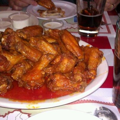 Photo taken at Pullanos Pizza &amp; Wings by Tom K. on 12/24/2011