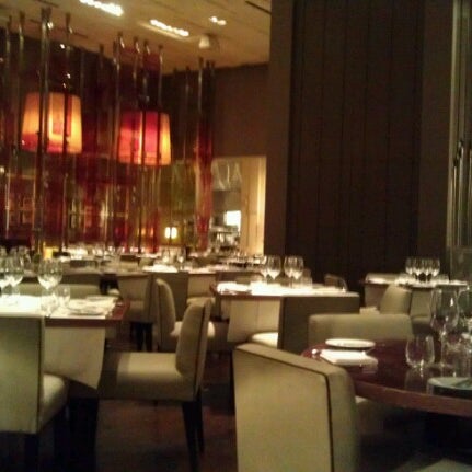 Photo taken at Wolfgang Puck American Grille by Suzanne R. on 6/14/2012