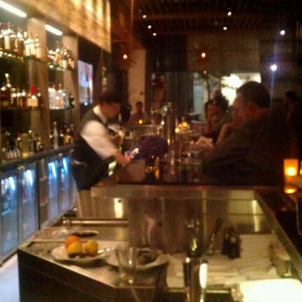 Photo taken at Catalyst Restaurant by Crystal K. on 9/25/2011