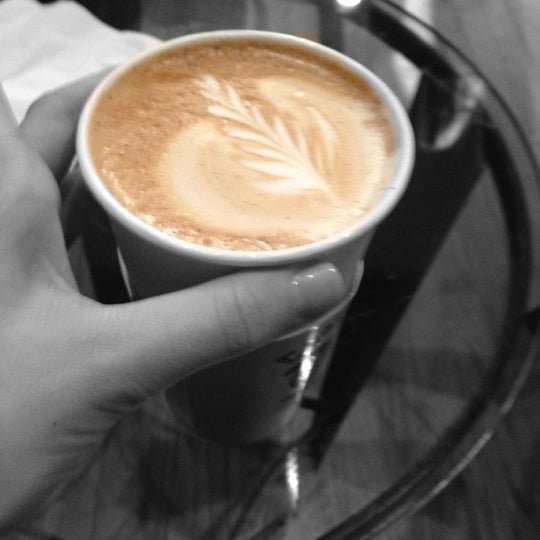 Photo taken at Cool Beans Coffee Roasters by Kristen R. on 3/13/2012