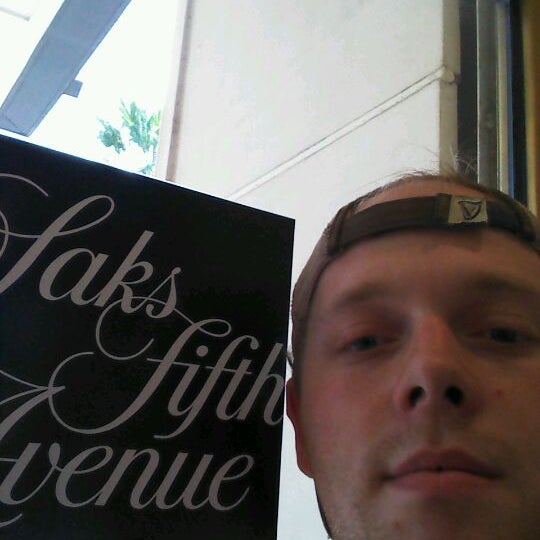 Photo taken at Saks Fifth Avenue by Christopher C. on 12/23/2011