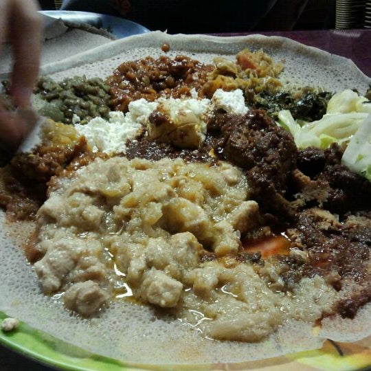 It's polite to only use your right hand when eating Ethiopian food. The left hand is considered unclean.