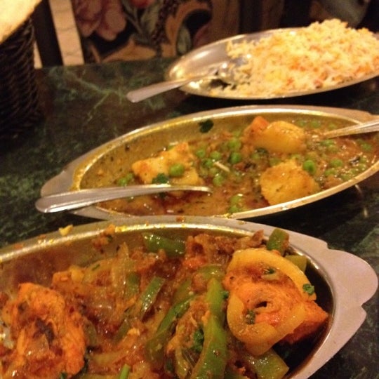 Photo taken at Darbar Restaurant by Marie V. on 2/22/2012