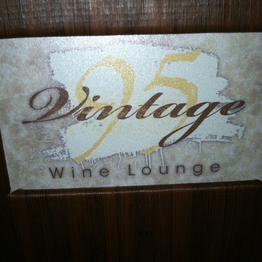 Photo taken at Vintage 95 Wine Lounge by Shelly F. on 5/5/2012