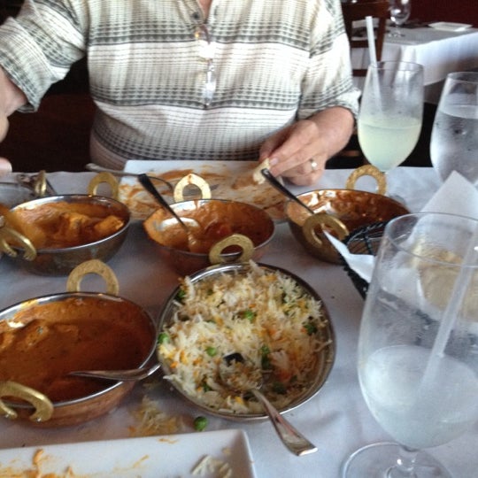 Photo taken at TAVA Contemporary Indian Cuisine by Maddie K. on 8/12/2012