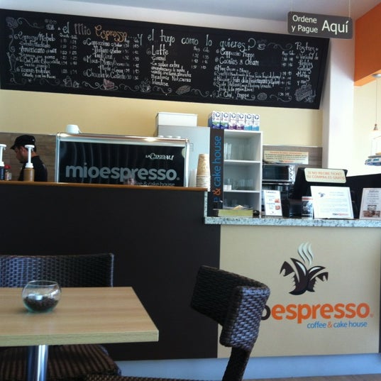Photo taken at Mioespresso Coffee &amp; Cake House by Priscila C. on 5/10/2012