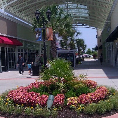 Photo taken at Tanger Outlets Charleston by Mary Catherine J. on 7/4/2012