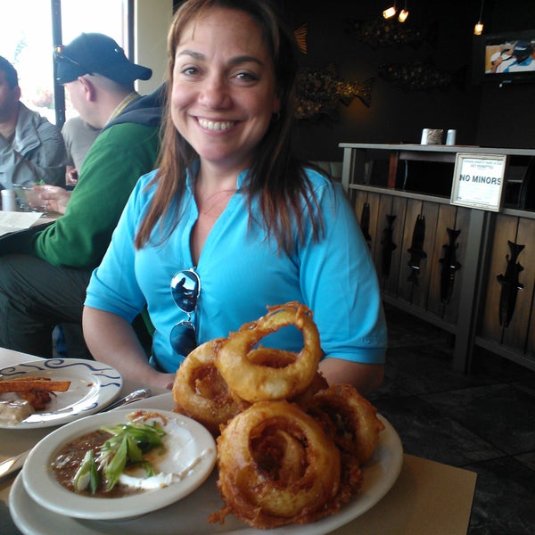 Photo taken at Downriggers Restaurant by Robyn G. on 4/21/2012