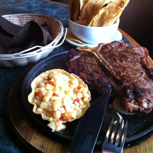 Photo taken at El Feligrez Steak House by Juan Raul L. on 6/30/2012