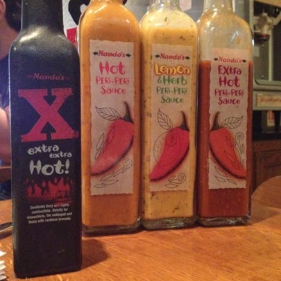 Photo taken at Nando&#39;s by Andrew I. on 8/21/2012