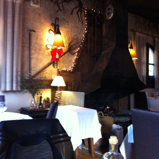 Photo taken at Restaurante Las Botas by Montserrat R. on 12/23/2011