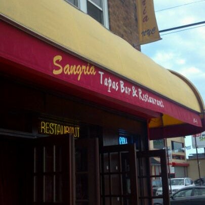 Photo taken at Sangria Tapas Bar &amp; Restaurant by Manny L. on 9/10/2011
