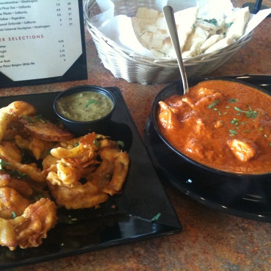 Photo taken at Tarka Indian Kitchen by Cameo R. on 4/3/2011