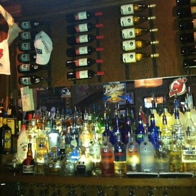 Photo taken at Mikie Squared Bar &amp; Grill by David K. on 8/18/2012