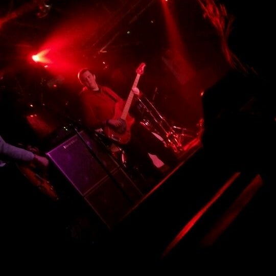 Photo taken at Revolution Bar &amp; Music Hall by Alex D. on 1/6/2012