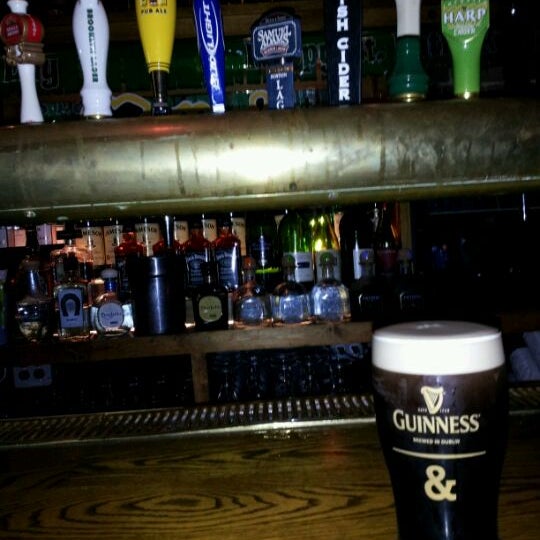 Photo taken at Molloy&#39;s Irish Pub by Greg H. on 3/16/2012