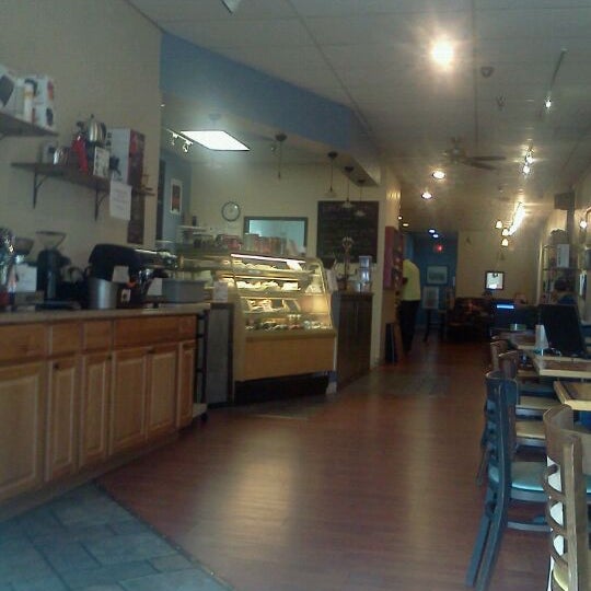 Photo taken at New World Coffee House by Whitney H. on 1/7/2012