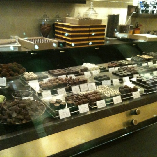 Photo taken at Chocolat Michel Cluizel by Mohammed N. on 12/26/2011