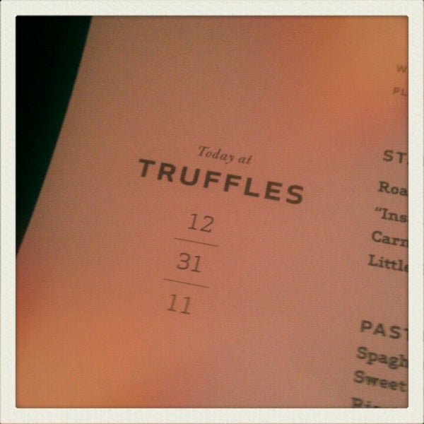 Photo taken at Truffles Restaurant by Kimberly H. on 1/1/2012