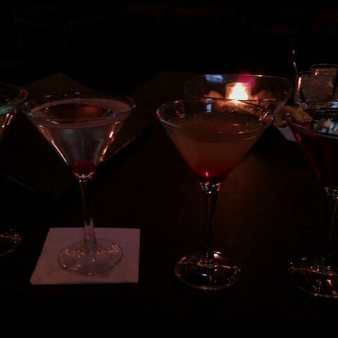 Photo taken at Downtown Main Martini Bar &amp; Grille by Jessica K. on 3/23/2011