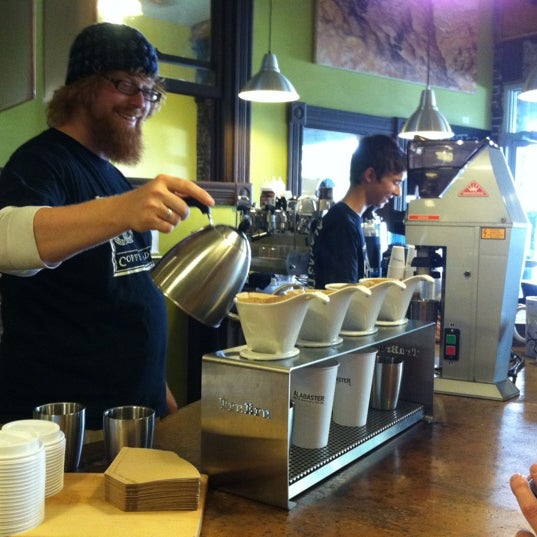 Photo taken at Alabaster Coffee Roaster &amp; Tea Co. by Valerie R. on 5/12/2012
