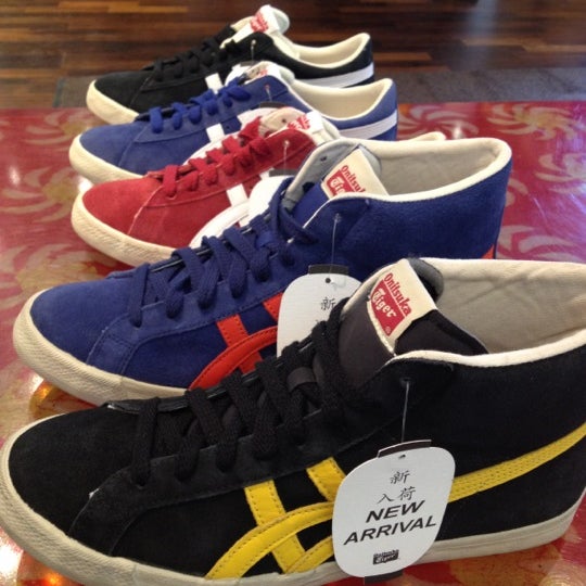 Photo taken at Onitsuka Tiger by Mariam S. on 4/20/2012