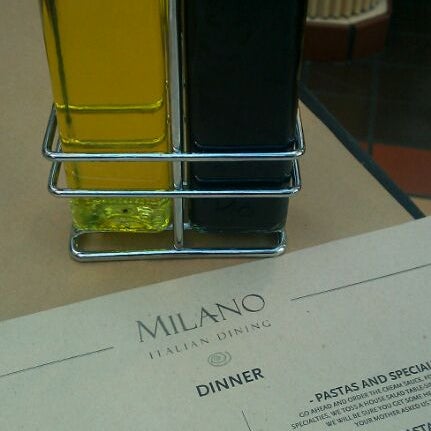 Photo taken at Milano Italian Dining by Caroline K. on 9/10/2011