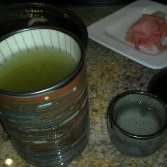 Photo taken at Sushi Sam by Angie P. on 12/1/2011