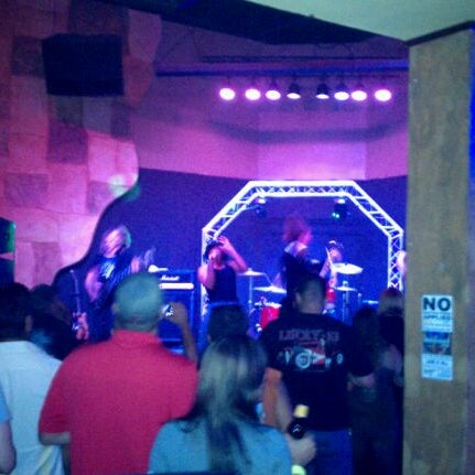 Photo taken at Hooligan&#39;s Bar &amp; Grill by Mario G. on 9/3/2011