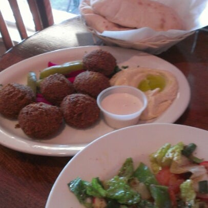 Photo taken at Afrah Mediterranean Restaurant &amp; Pastries by Amy B. on 8/1/2012