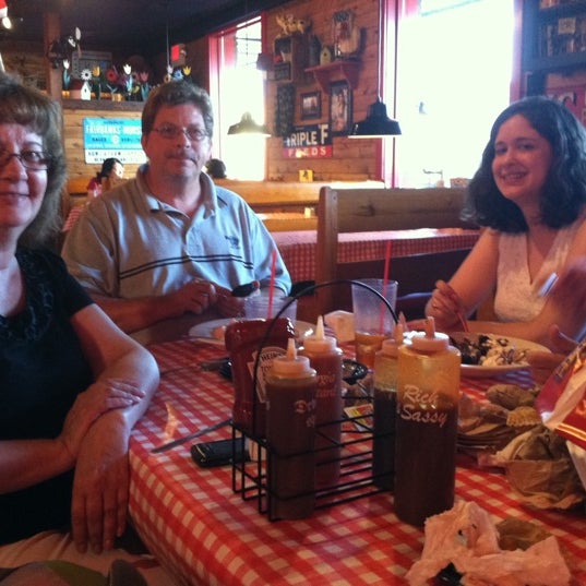 Photo taken at Famous Dave&#39;s by Lauren E. on 7/26/2011