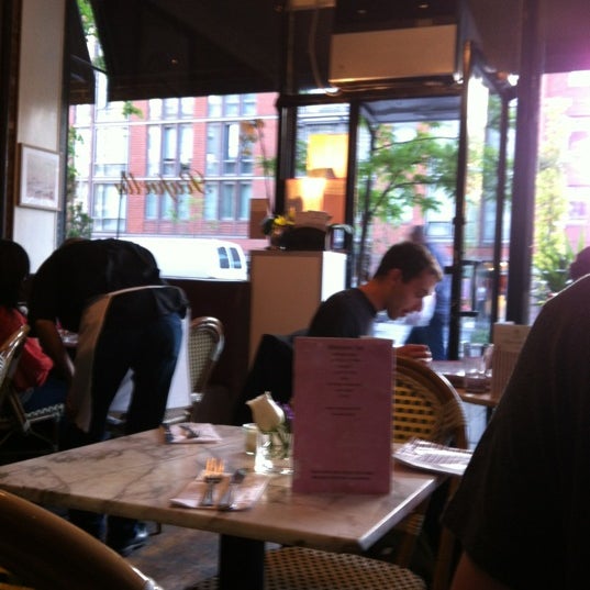 Photo taken at Rafaella Cafe by Patrick B. on 5/17/2012