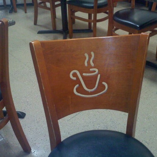 Photo taken at Brewd: A Coffee Lounge by Emmy B. on 3/23/2012