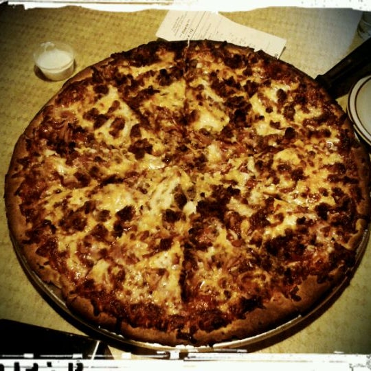 Photo taken at Hideaway Pizza by Mike H. on 3/18/2012