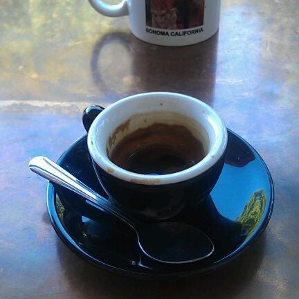 Photo taken at Sunflower Caffé Espresso &amp; Wine by Justin I. on 8/19/2012