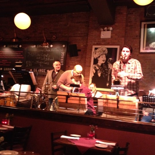 Photo taken at Garage Restaurant &amp; Cafe by Bob W. on 1/11/2012
