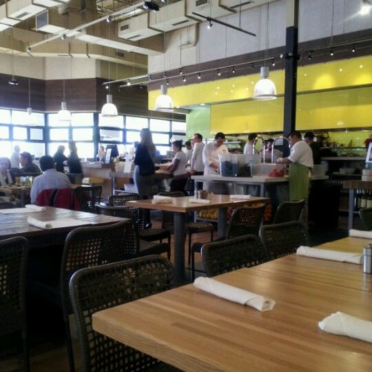 Photo taken at True Food Kitchen by Laureen O. on 12/19/2011
