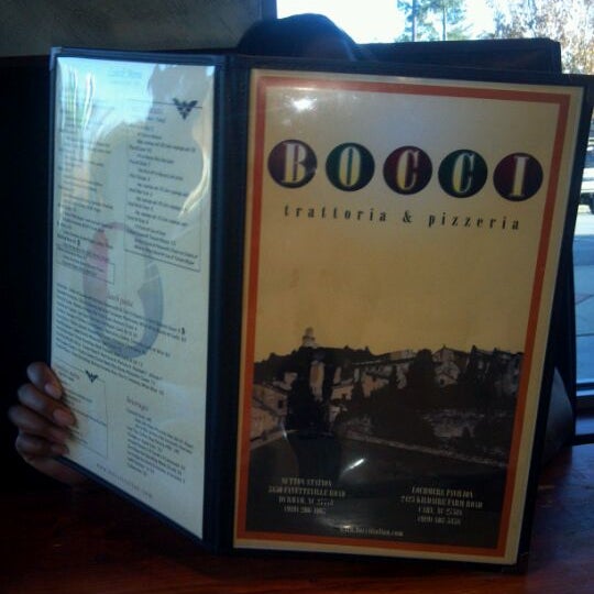 Photo taken at Bocci Trattoria &amp; Pizzeria by Evette A. on 12/4/2011