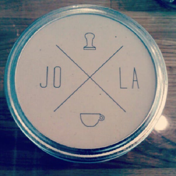 Photo taken at JoLa Cafe by Courtney H. on 9/11/2012