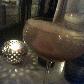 Photo taken at Uva Wine &amp; Cocktail Bar by Albert B. on 1/29/2012