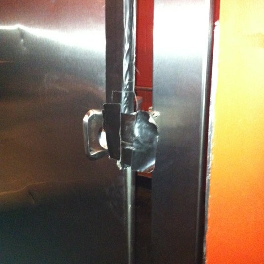 Great duct tape door lock on the men's room.