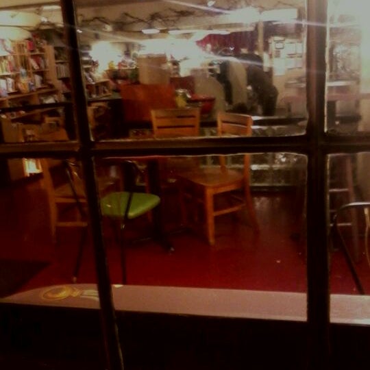 Photo taken at Firestorm Cafe &amp; Books by james h. on 12/31/2011