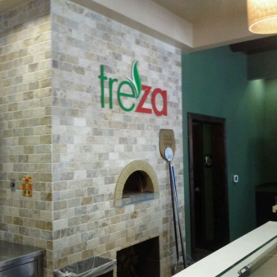 Photo taken at Treza Fine Salad &amp; Wood-Fired Pizza Co by Evan C. on 11/17/2011