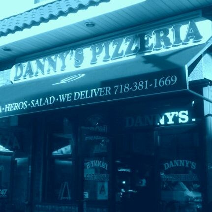 Photo taken at Danny&#39;s Pizzeria by Travis G. on 12/23/2011