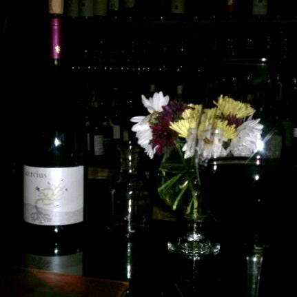 Photo taken at Left Coast Wine Bar by Gaston H. on 2/3/2012