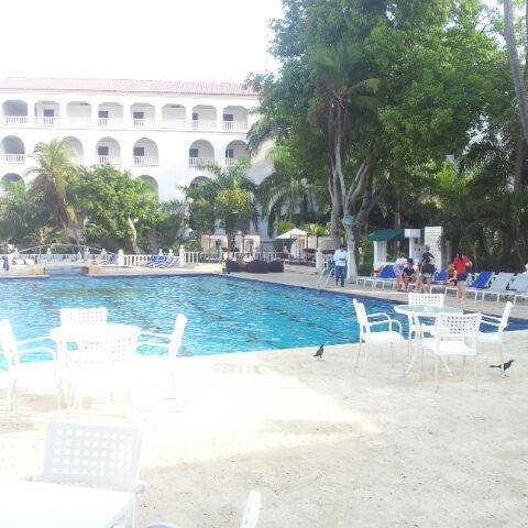 Photo taken at Hotel Caribe by Eduardo P. on 3/30/2012