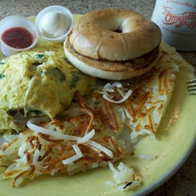 Photo taken at The Omelette Shoppe by Jessica R. on 3/18/2012