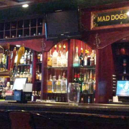 Photo taken at Mad Dogs British Pub by Steven P. on 8/5/2012