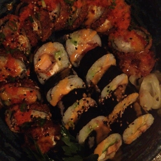 Foto diambil di Tangerine Fusion + Sushi Bar oleh Nami F. pada 6/23/2012